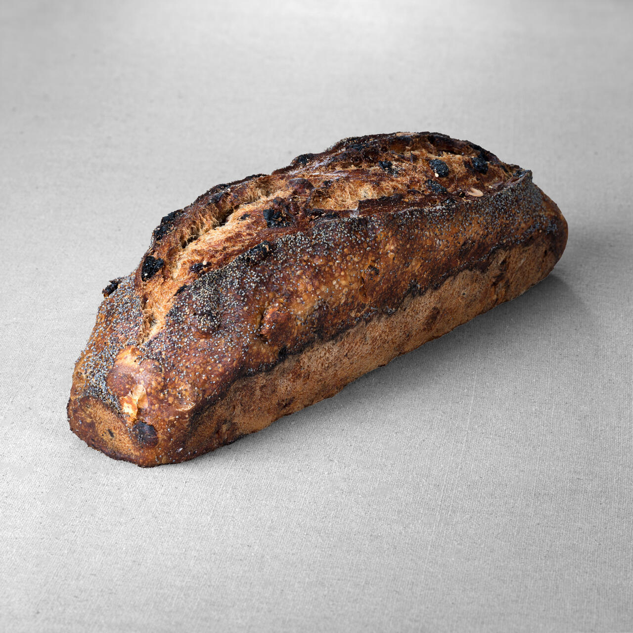Pain issu d'une farine de blé blanche au pur levain naturel aux fruits secs