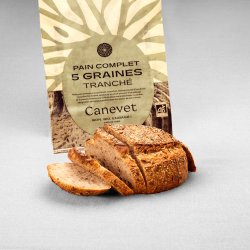 Pain complet 5 graines au pur levain naturel tranché avec packaging en arrière plan