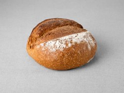 Petit pain issu d'une farine de blé complète non moulé au pur levain naturel