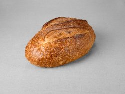 Grand pain issu d'une farine de blé blanche non moulé au pur levain naturel