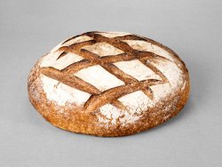 Grand pain rond issu d'une farine de blé blanche au pur levain naturel