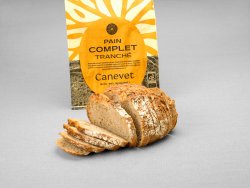 Pain complet au pur levain naturel tranché avec packaging en arrière plan