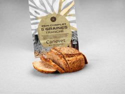 Pain complet 5 graines au pur levain naturel tranché avec packaging en arrière plan