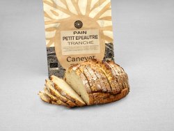 Pain petit épeautre au pur levain naturel tranché avec packaging en arrière plan