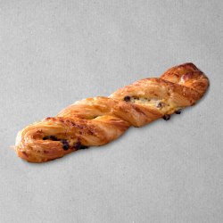 Torsade au chocolat posée sur un fond gris